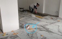 Floor tiles grout crack and uneven