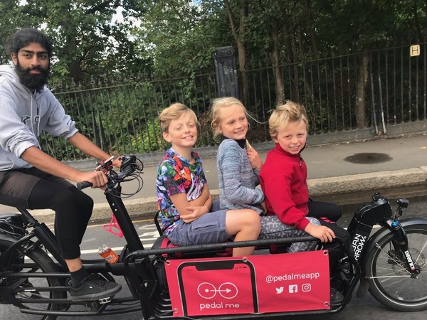Taxis / taxi bikes??? for school run - London