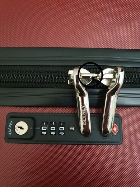 Suitcase locked with everything inside