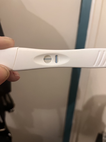 12 DPO faint line - am I pregnant?