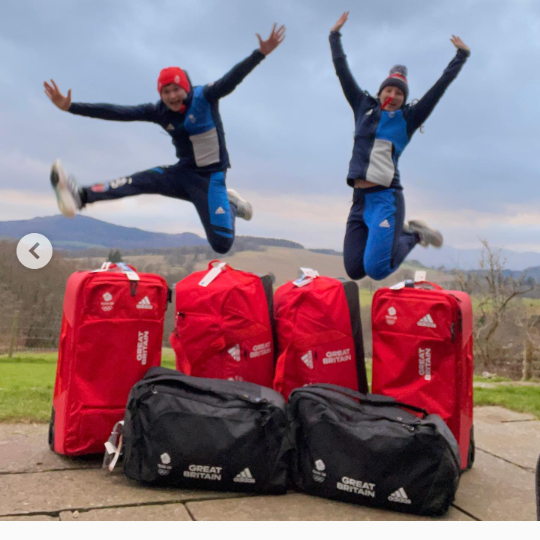 Curling team jumping for joy photo