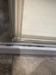 How to get rid of this around my shower (sealant?)