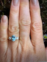 Show me your aquamarine ring please.