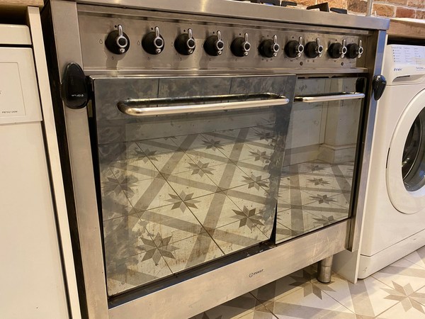 Range cooker: oven door misalligned while moving and doesn't close anymore!