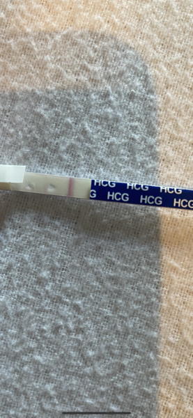 8 days DPO - possible positive test and implantation bleeding
