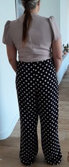 Can a 45 year old size 14 get away with a jumpsuit?