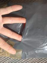 creepy -  mailing bag (aka parcel) arrived with a slit cut