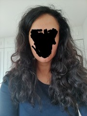 Curly hair with long face - what style would suit me?