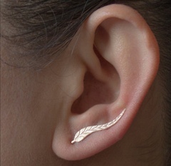 How on earth do I get these earrings in??