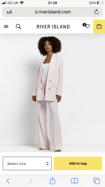 Has anyone spotted a pink trouser suit recently?