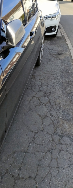 Surely neighbour cannot park here?!