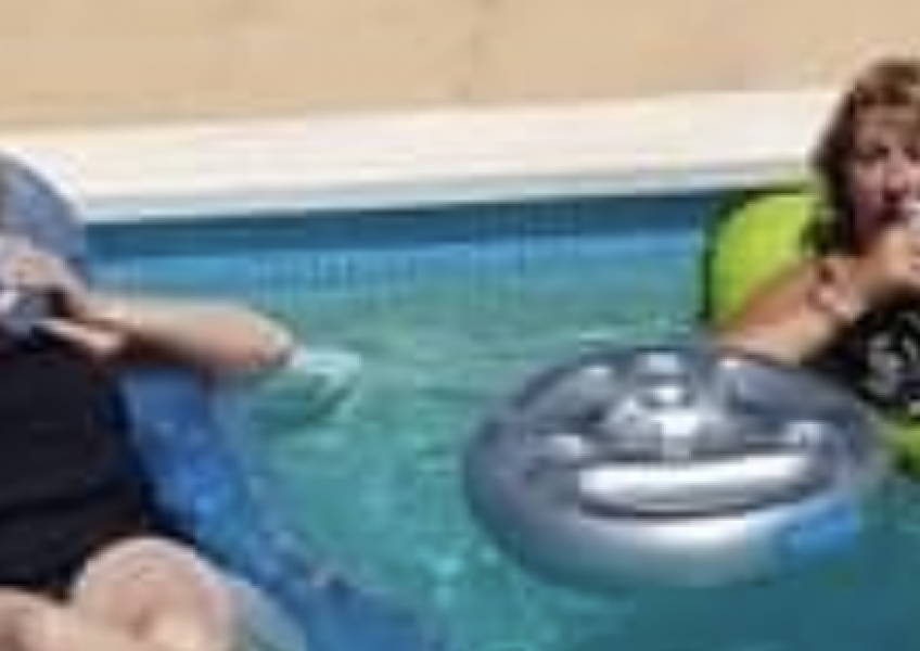 Chihuahua sun the hot tub