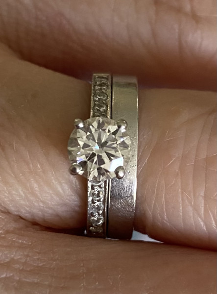.. to ask to see your engagement & wedding rings? :D
