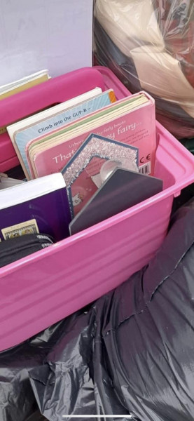 Fly tipping outside charity shop