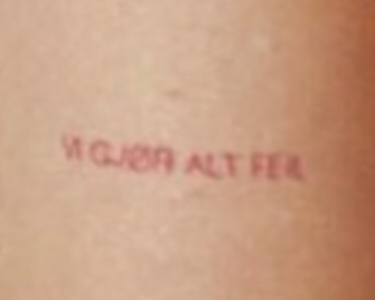 Please tell me what this says... Pic attached