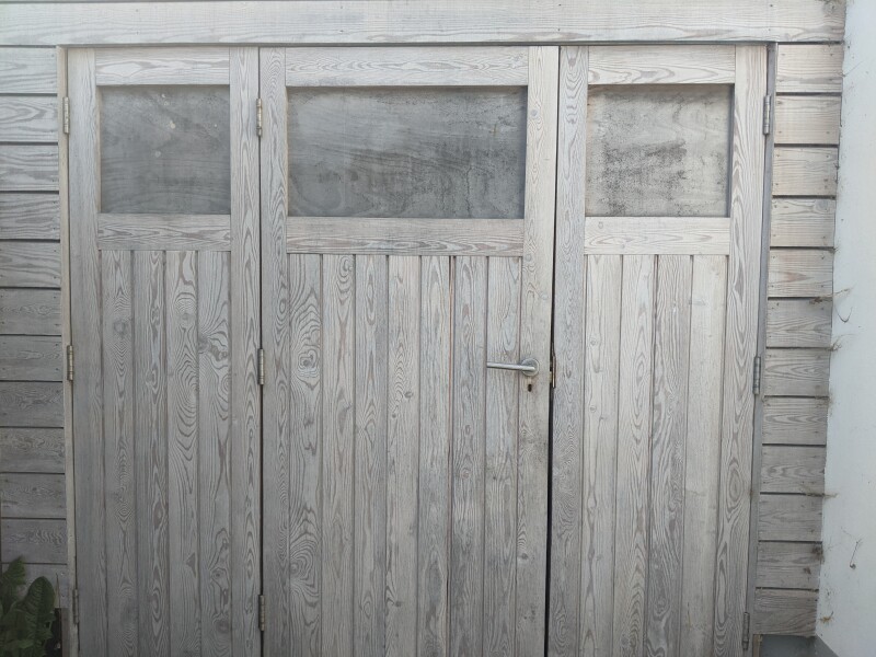 Anyone regret having side-hanging garage doors?