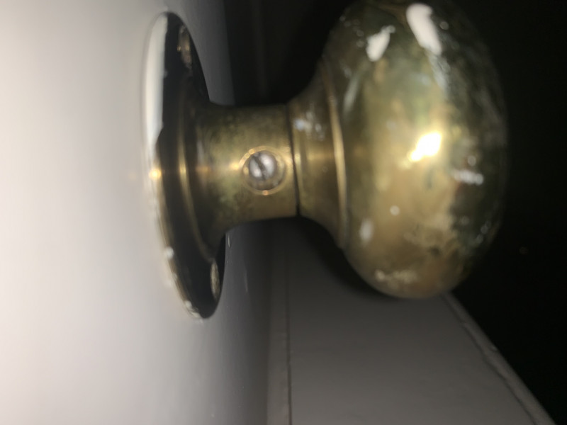 Wobbly brass door knobs