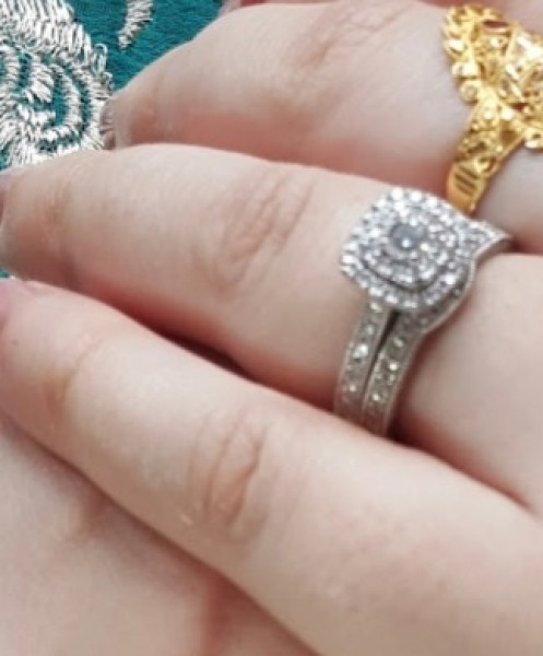 .. to ask to see your engagement & wedding rings? :D