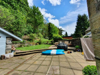 Puppy question - large garden but not possible to fence it...