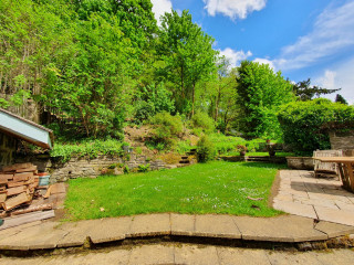 Puppy question - large garden but not possible to fence it...