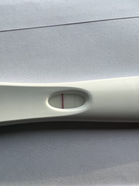 Faint positive or evaporation line?