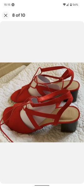 What colour bag with this wedding guest outfit!