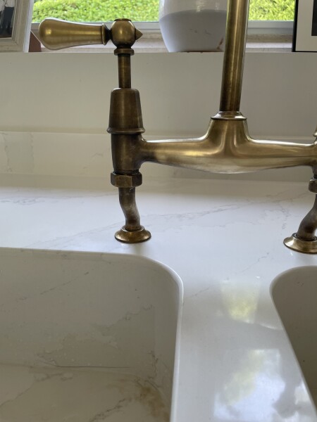 Help! Cleaner has cleaned off the antique brass finish on our taps!