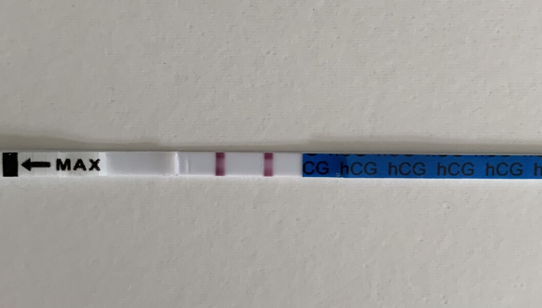 Stomach growing,  one faint positive test, lots of negatives? 