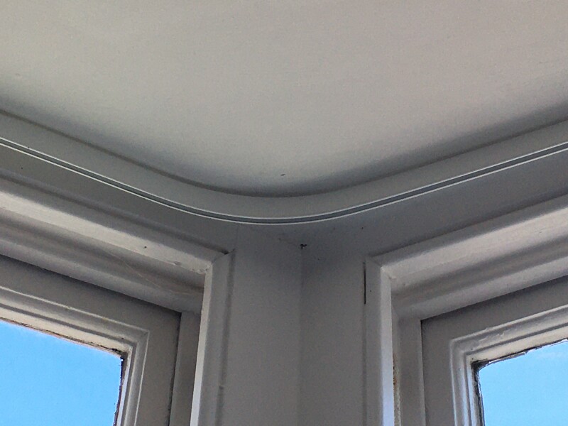 Would a double curtain rail look a mess?