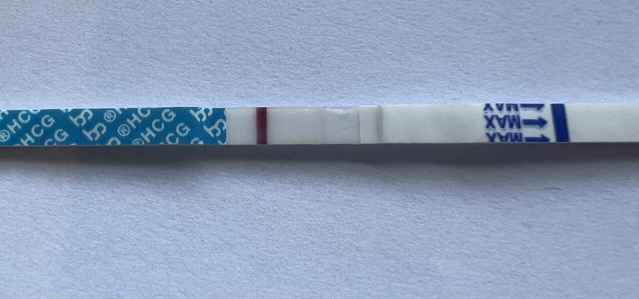 Faint positive or evaporation line?