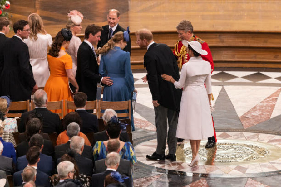 Why did Harry and Meghan walk in alone?