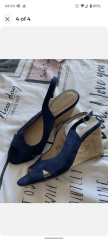 What colour bag with this wedding guest outfit!