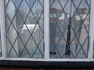 Repairing bird damage to putty on leaded windows