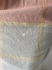 Bleach spot on new cotton dress