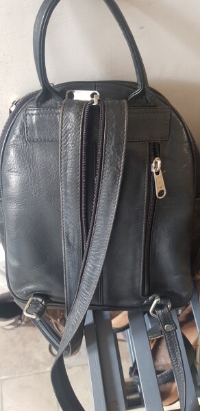 Wearing a small crossbody & backpack together