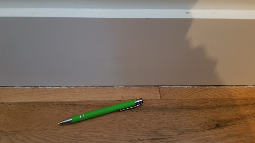 How to block weed smell coming under wall?