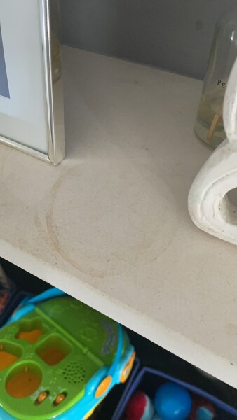Tea marks on fireplace