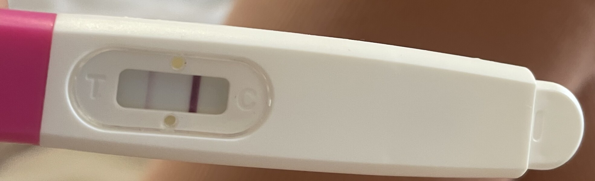 Faint pregnancy test but not due on for another 5 days. Am I pregnant? Would it show this early?