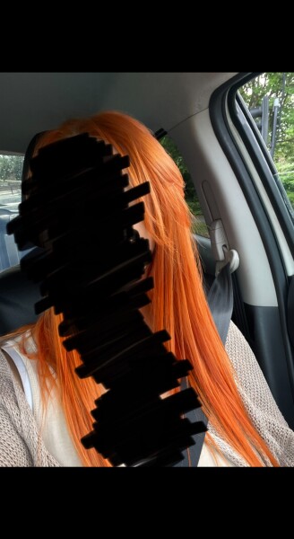 Red hair fading to brassy blonde after a fortnight - is this why?