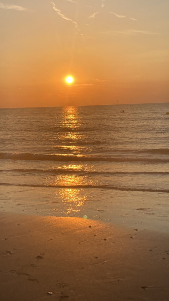 Help me find a southern seaside town for day trip this weekend!