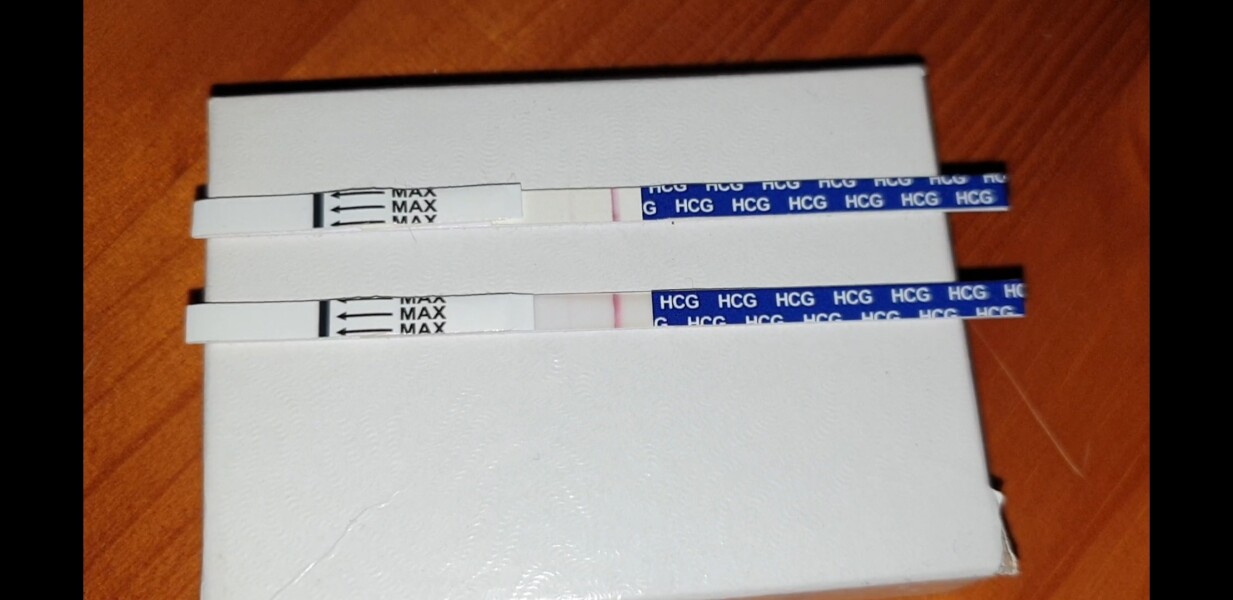 12 dpo. Anyone see a v faint line please?!