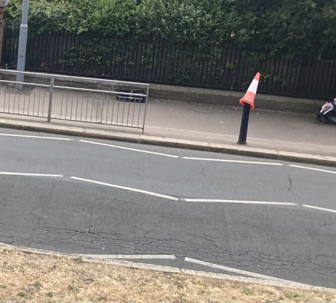 AIBU to be curious about abandoned suitcase across road?