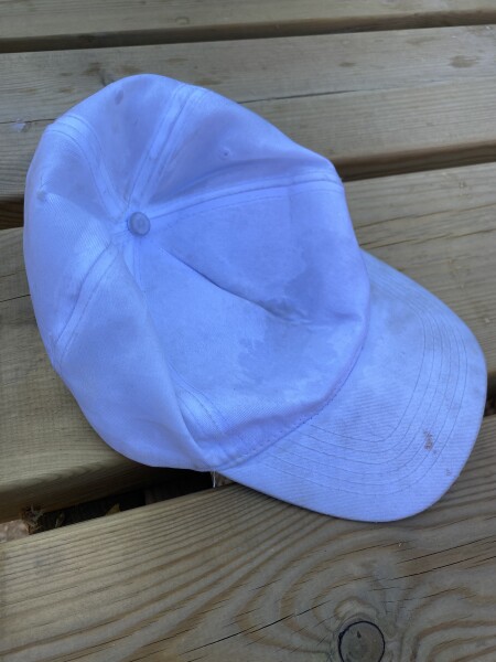 How to get this cap white again?