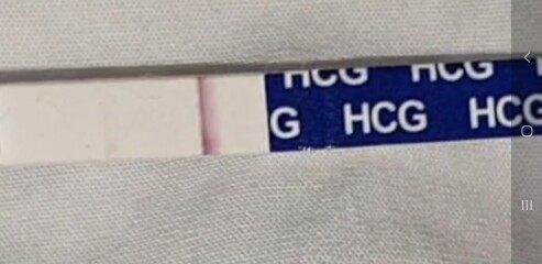 12 dpo. Anyone see a v faint line please?!