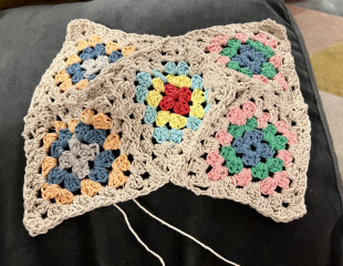 It's Crochet,  Knit & Natter 9: So Many Projects, So Little Time. (Oh well - I almost made it rhyme!)