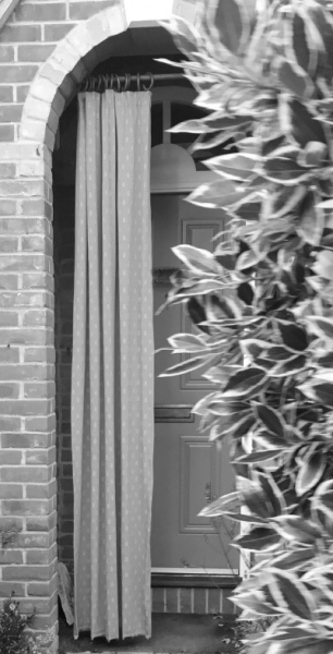 To wonder why you’d put a curtain outside your front door?! [pic]