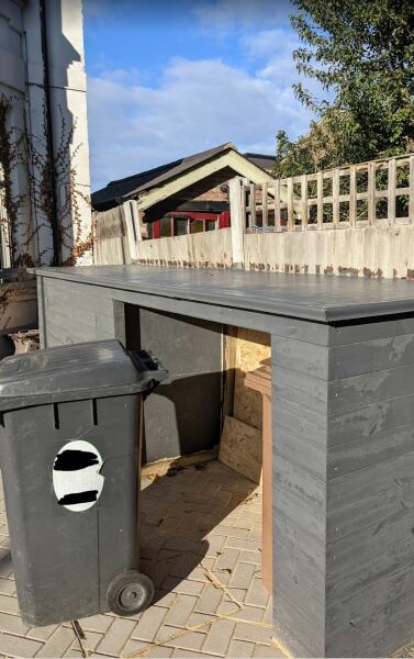 to report neighbour's bin store?