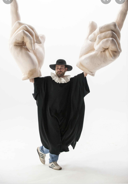 Who is the bearded man who is always with King Charles?