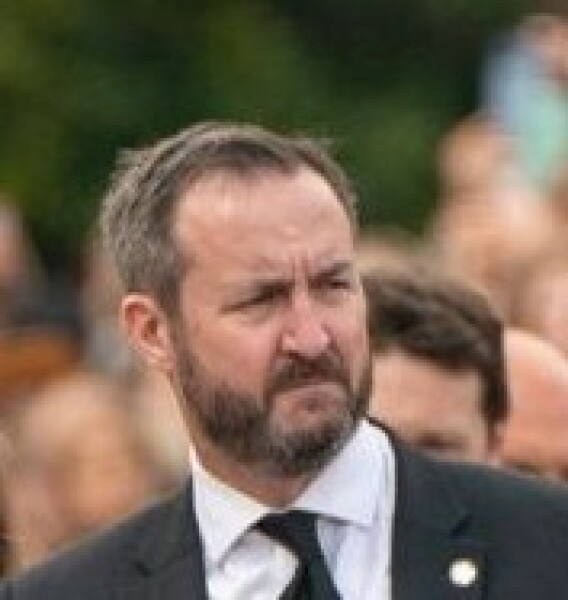 Who is the bearded man who is always with King Charles?