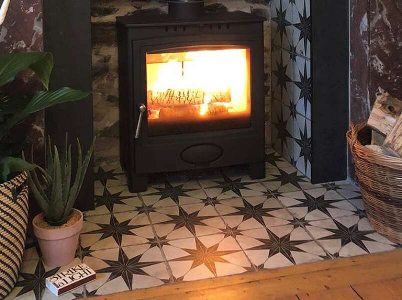 ...to ask you what tiles you used under a log burner? 